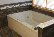 Wood Tile Floor with a Mosiac border