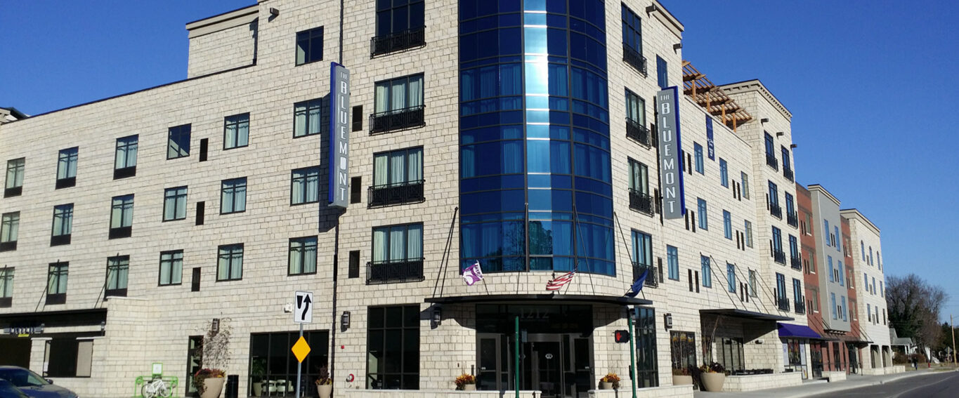 Exterior of a hotel in Manhattan, Kansas where Absolute Building Concepts completed commercial construction support and building restoration.