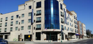 Exterior of a hotel in Manhattan, Kansas where Absolute Building Concepts completed commercial construction support and building restoration.
